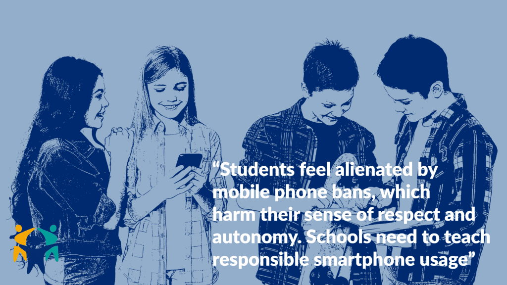 A group of students using smartphones in a classroom, promoting digital citizenship education for wellbeing at school